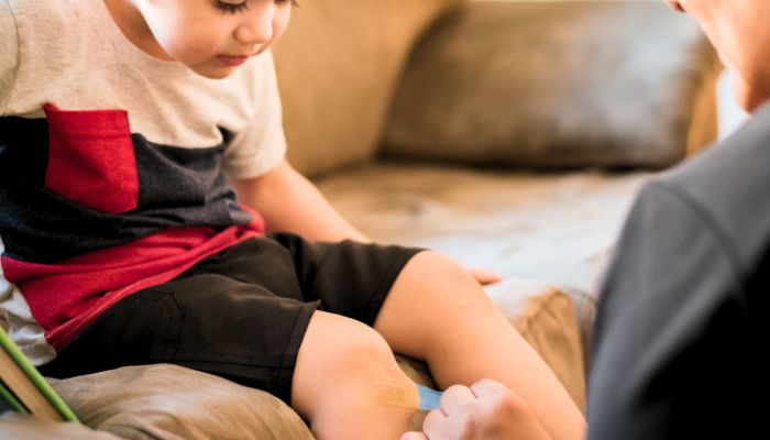  a-little-boy-with-a-cut-on-his-knee